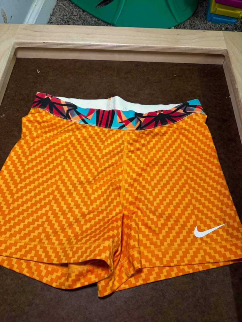 Nike Women’s Orange Geometric Athletic Shorts with Multicolor Waistband